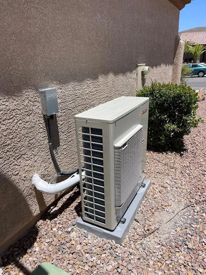 Residential air conditioning condenser unit in Osceola